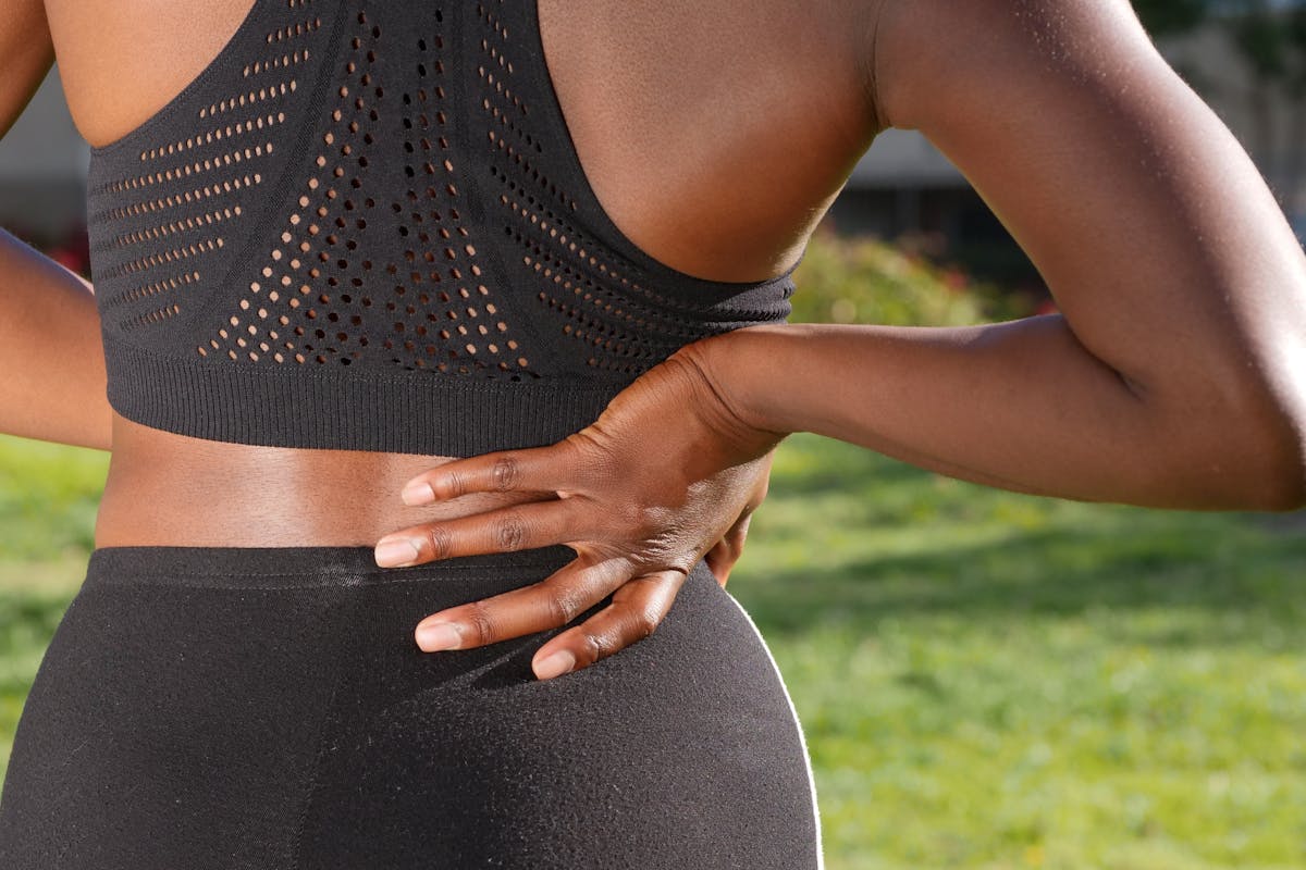 a woman with an aching body